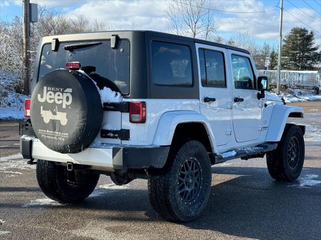 used 2014 Jeep Wrangler Unlimited car, priced at $13,975