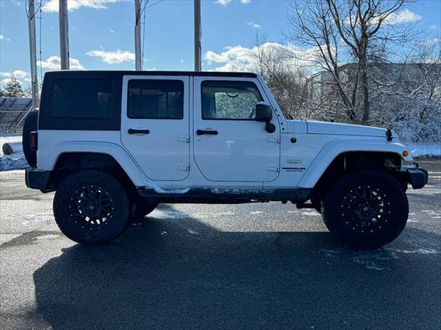 used 2014 Jeep Wrangler Unlimited car, priced at $13,975