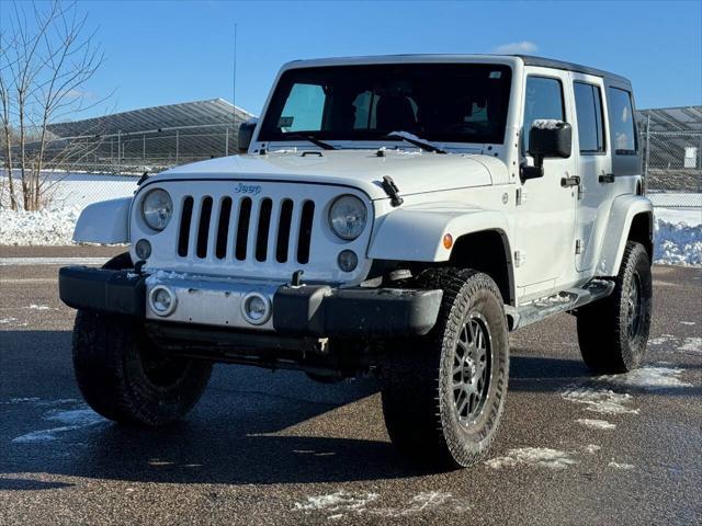 used 2014 Jeep Wrangler Unlimited car, priced at $13,975