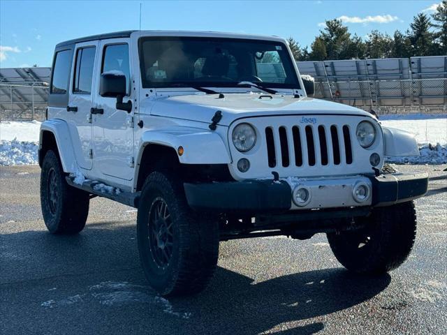 used 2014 Jeep Wrangler Unlimited car, priced at $13,975