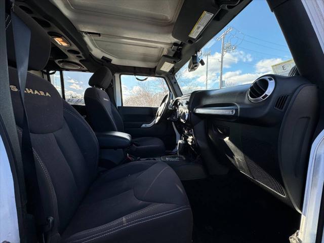 used 2014 Jeep Wrangler Unlimited car, priced at $13,975