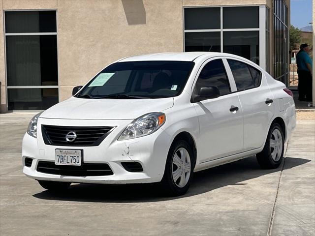used 2014 Nissan Versa car, priced at $7,000