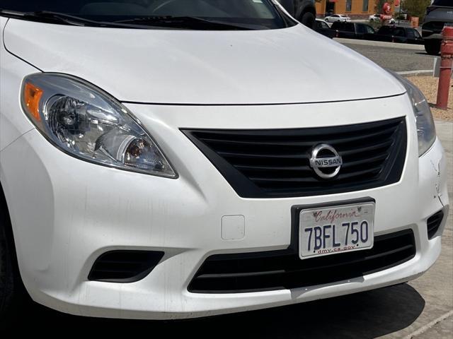 used 2014 Nissan Versa car, priced at $7,000