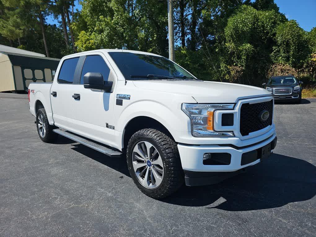 used 2019 Ford F-150 car, priced at $23,496