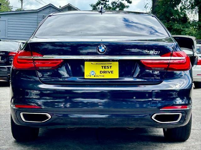 used 2016 BMW 750 car, priced at $19,995