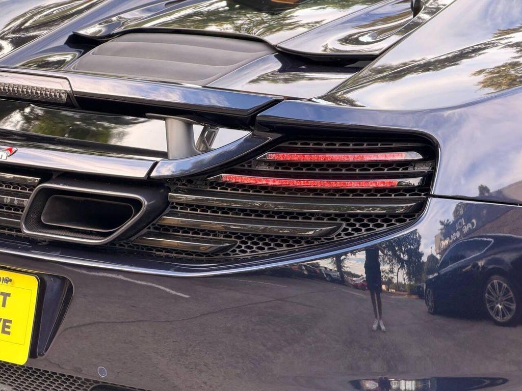 used 2013 McLaren MP4-12C car, priced at $94,995