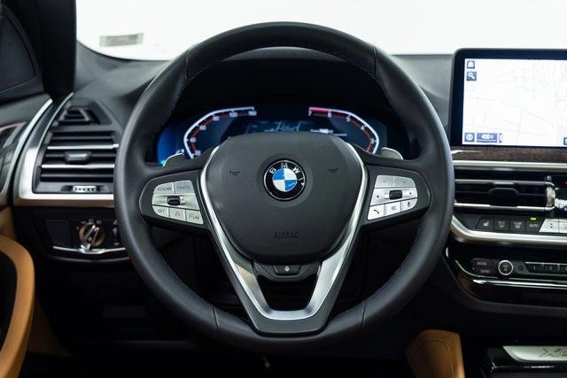 used 2025 BMW X4 car, priced at $54,995
