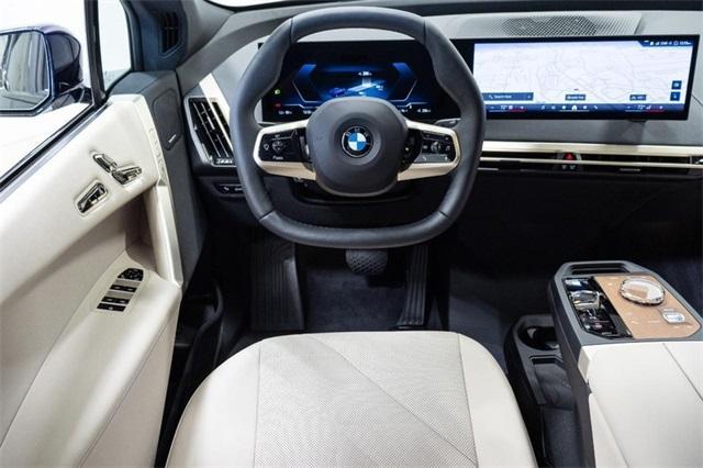 new 2026 BMW iX car, priced at $87,675
