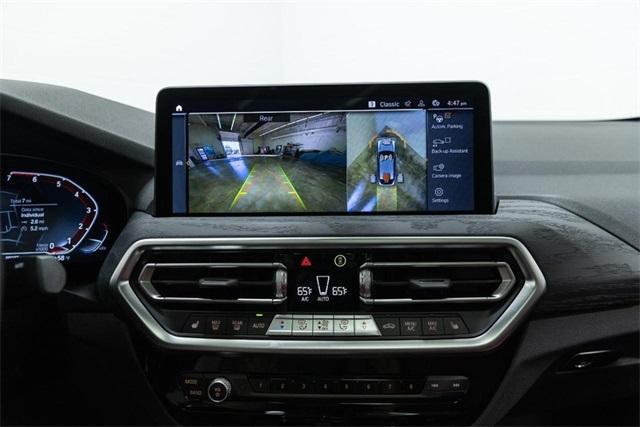 used 2025 BMW X4 car, priced at $56,500