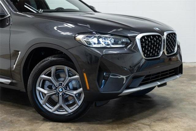 used 2025 BMW X4 car, priced at $56,500