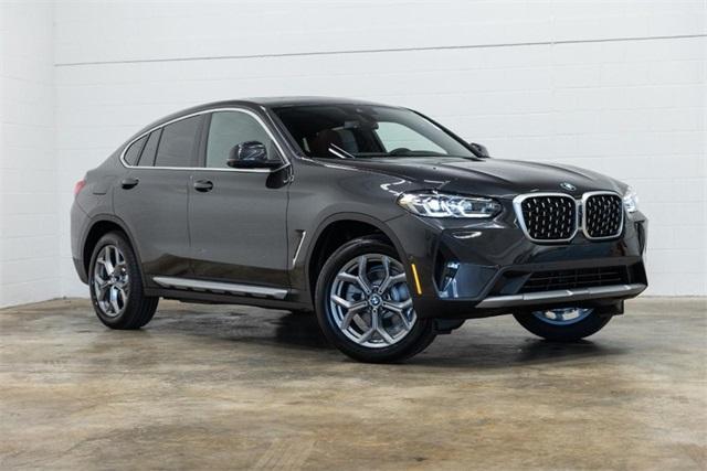 used 2025 BMW X4 car, priced at $56,500