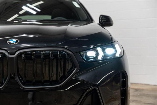 new 2025 BMW X6 car, priced at $85,275