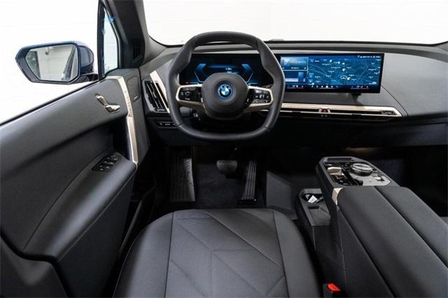 new 2024 BMW iX car, priced at $95,095