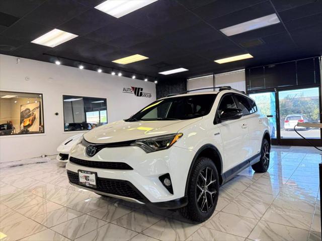 used 2018 Toyota RAV4 Hybrid car, priced at $19,998