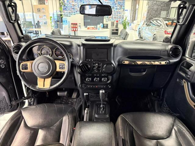 used 2014 Jeep Wrangler Unlimited car, priced at $18,497