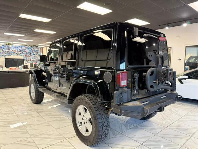 used 2014 Jeep Wrangler Unlimited car, priced at $18,497