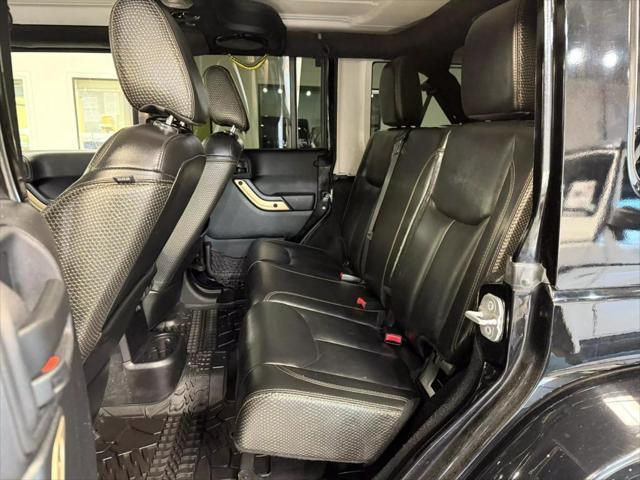 used 2014 Jeep Wrangler Unlimited car, priced at $18,497