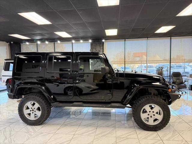 used 2014 Jeep Wrangler Unlimited car, priced at $18,497