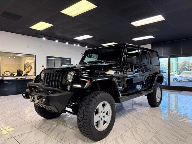 used 2014 Jeep Wrangler Unlimited car, priced at $18,497