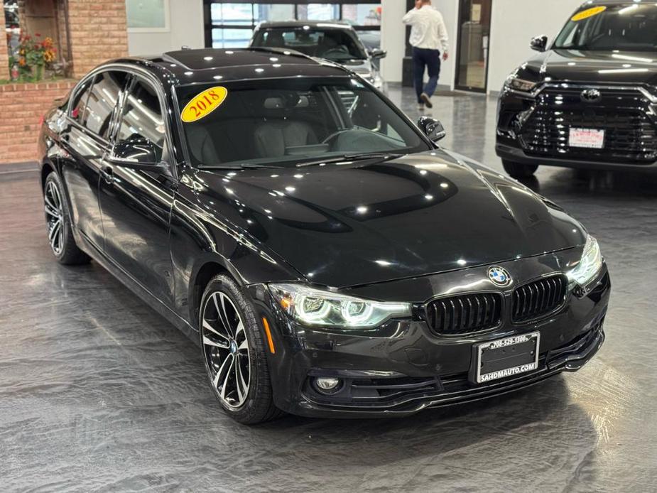 used 2018 BMW 330 car, priced at $15,888