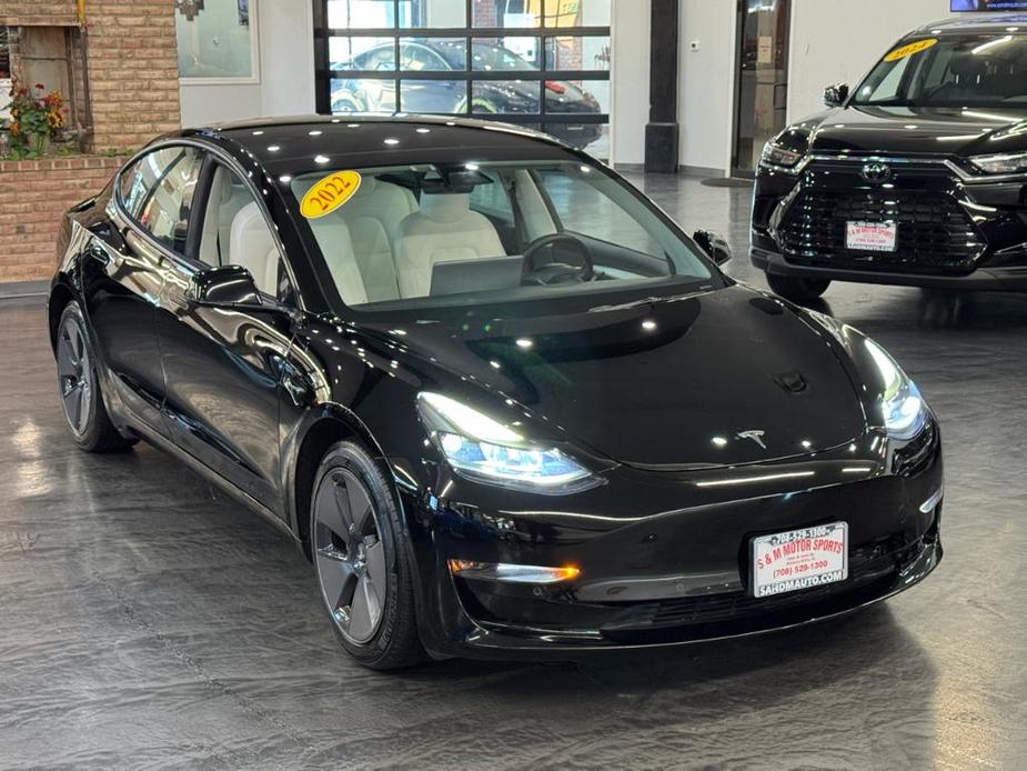 used 2022 Tesla Model 3 car, priced at $28,488