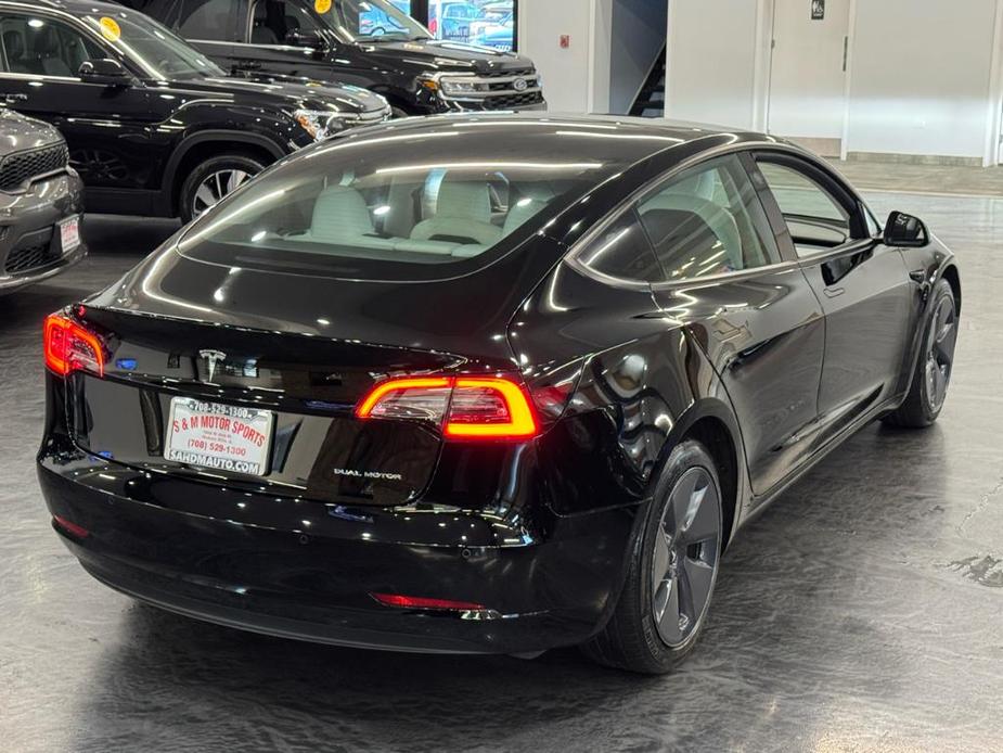 used 2022 Tesla Model 3 car, priced at $28,488