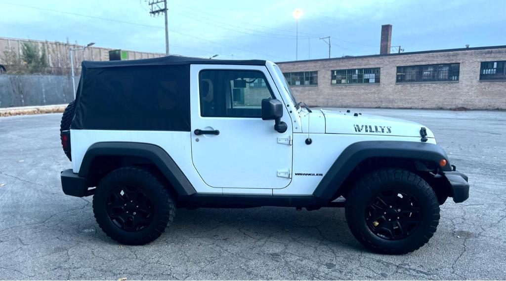 used 2015 Jeep Wrangler car, priced at $15,995