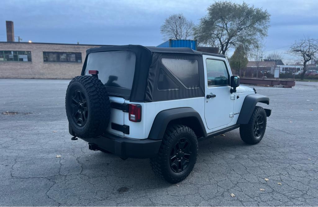 used 2015 Jeep Wrangler car, priced at $15,995