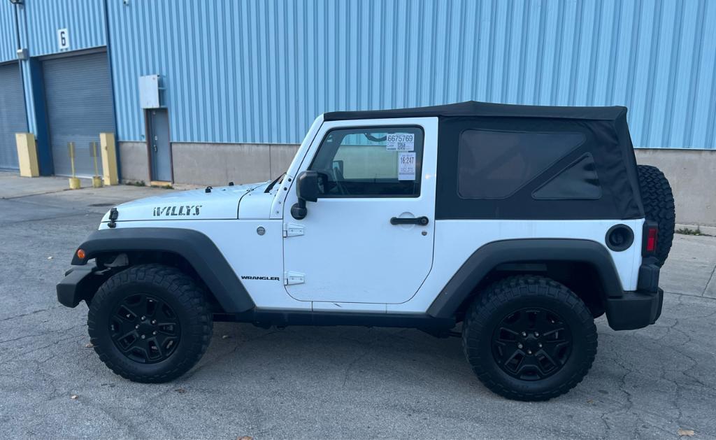 used 2015 Jeep Wrangler car, priced at $15,995