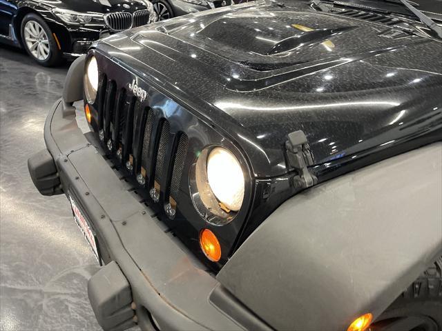 used 2012 Jeep Wrangler Unlimited car, priced at $18,788