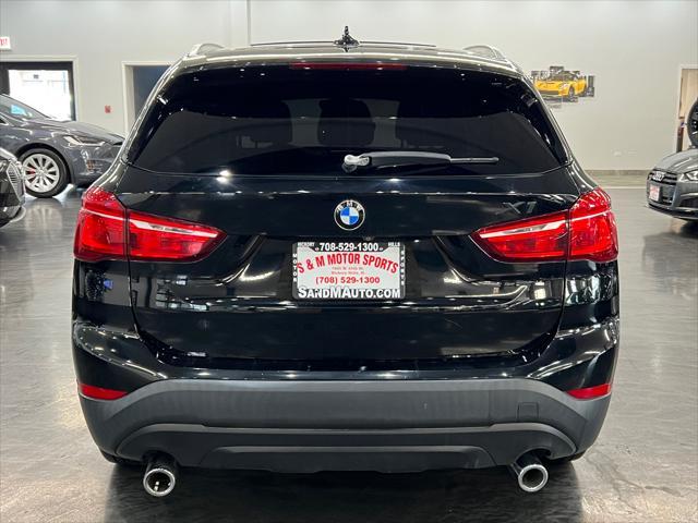 used 2018 BMW X1 car, priced at $17,988