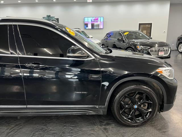 used 2018 BMW X1 car, priced at $17,988