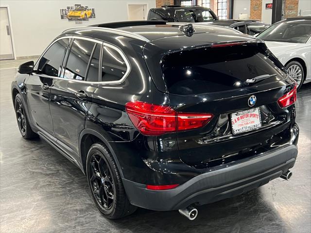 used 2018 BMW X1 car, priced at $17,988