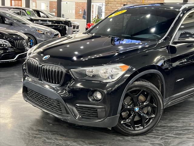 used 2018 BMW X1 car, priced at $17,988