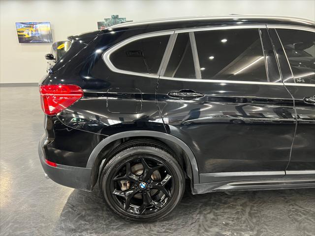 used 2018 BMW X1 car, priced at $17,988