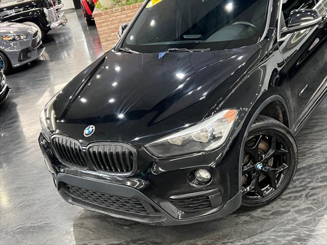 used 2018 BMW X1 car, priced at $17,988