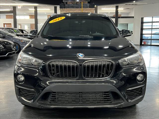 used 2018 BMW X1 car, priced at $17,988