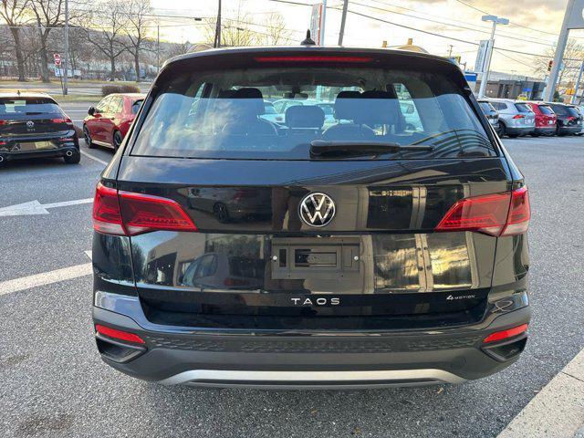 used 2024 Volkswagen Taos car, priced at $22,999