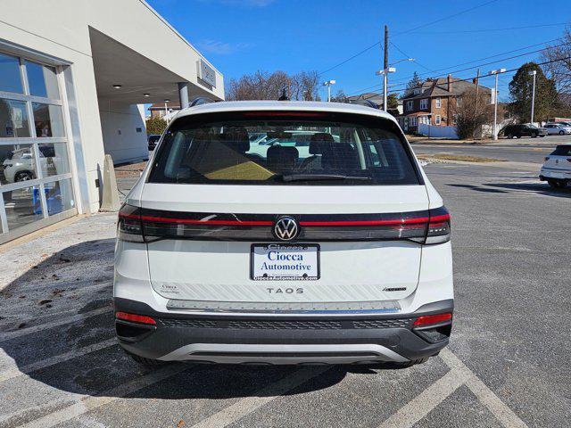 new 2025 Volkswagen Taos car, priced at $28,035