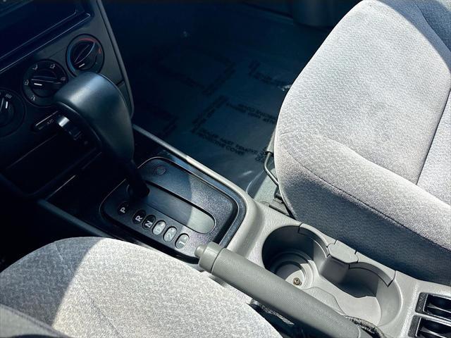 used 2003 Kia Spectra car, priced at $3,999