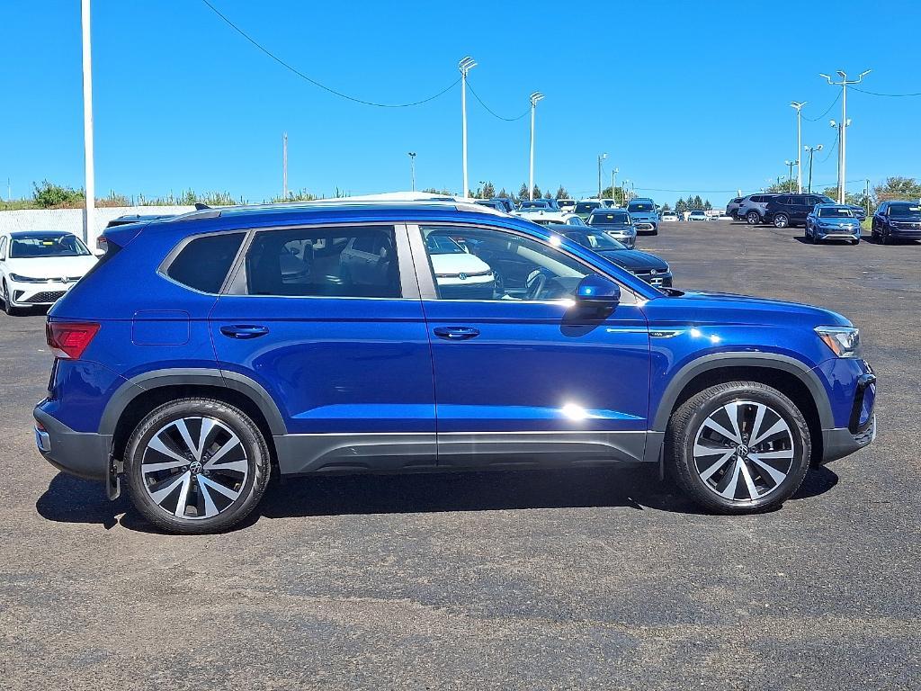 used 2023 Volkswagen Taos car, priced at $29,999