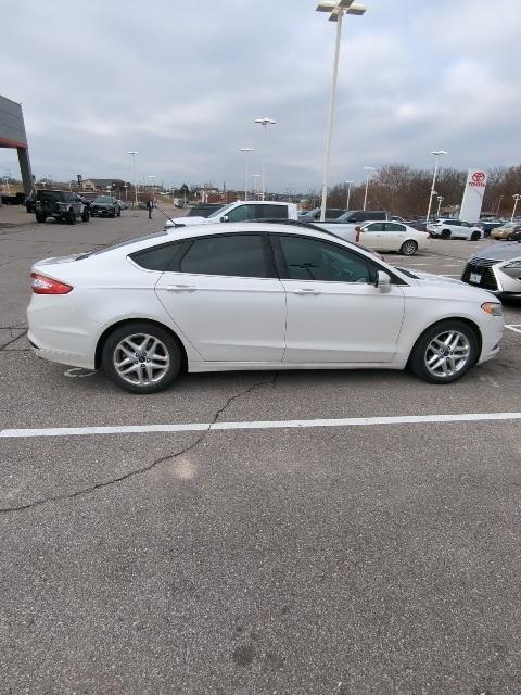 used 2016 Ford Fusion car, priced at $10,991