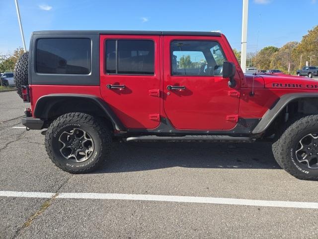 used 2012 Jeep Wrangler Unlimited car, priced at $15,991