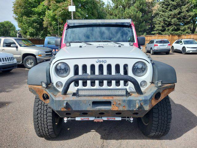 used 2014 Jeep Wrangler car, priced at $13,176
