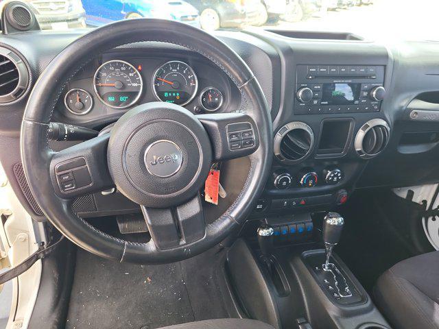 used 2014 Jeep Wrangler car, priced at $13,176