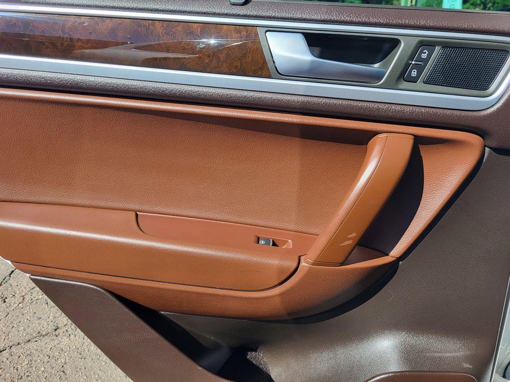 used 2014 Volkswagen Touareg Hybrid car, priced at $11,576