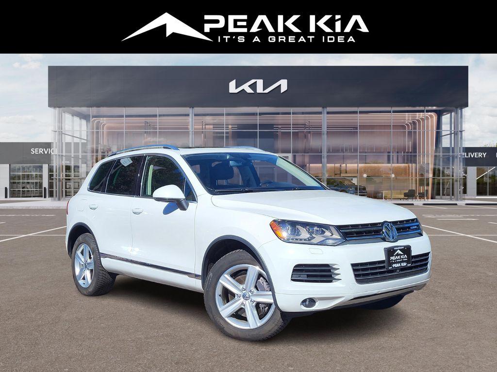 used 2014 Volkswagen Touareg Hybrid car, priced at $12,787