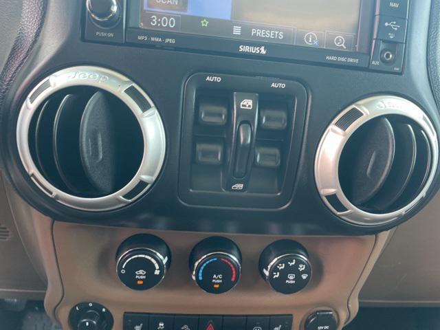 used 2012 Jeep Wrangler Unlimited car, priced at $14,700