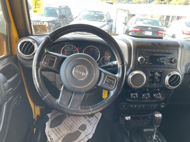 used 2015 Jeep Wrangler Unlimited car, priced at $17,450