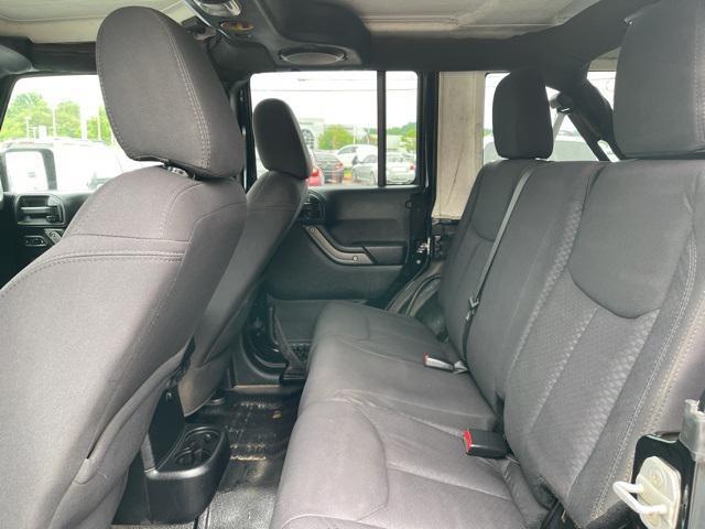 used 2013 Jeep Wrangler Unlimited car, priced at $13,450